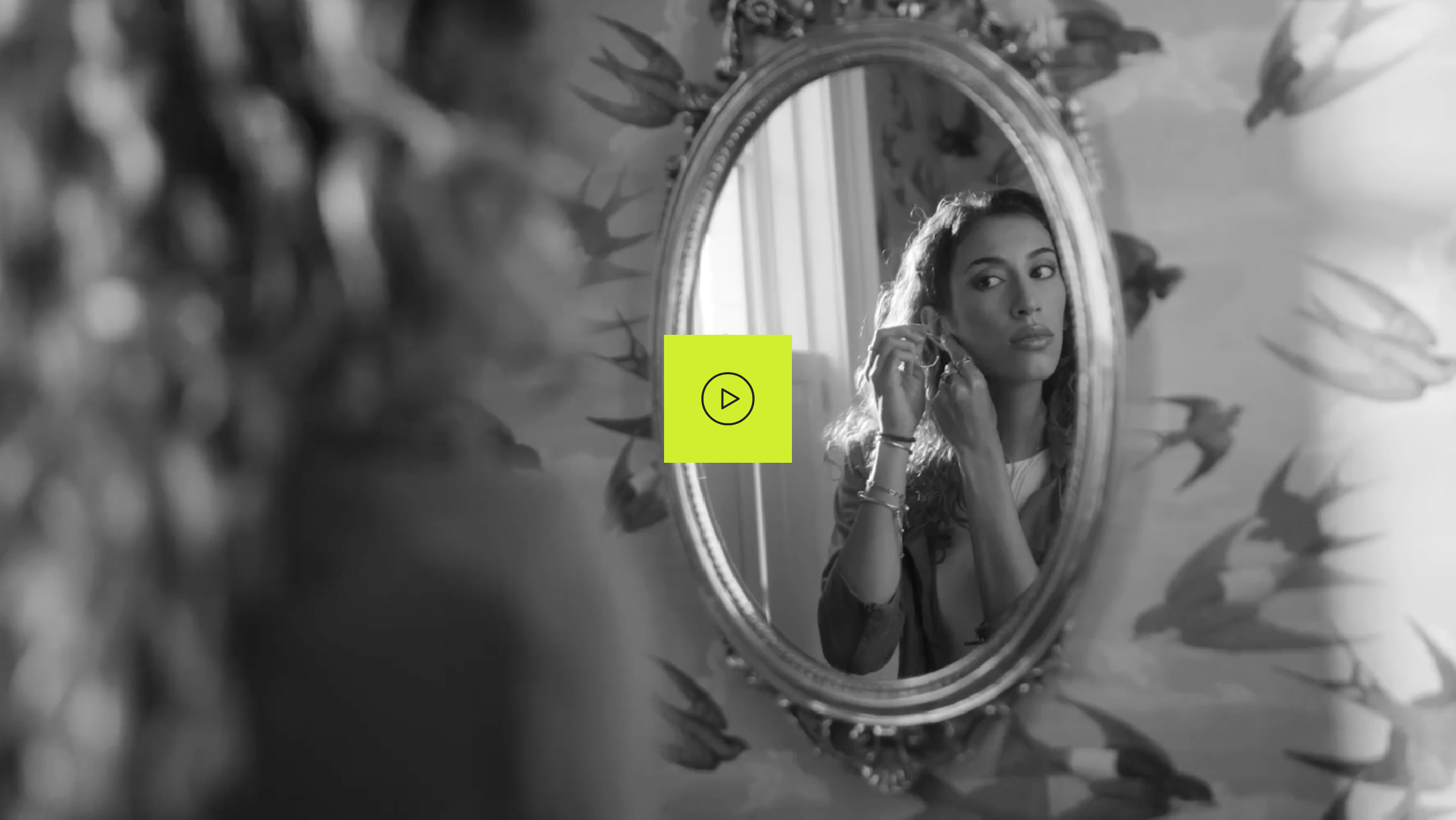 Ambassador Veronica, who has LOPD, looking in a mirror and putting on makeup